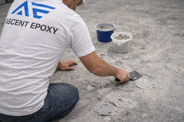 Grinding and preparing concrete after coating removal in Broward County