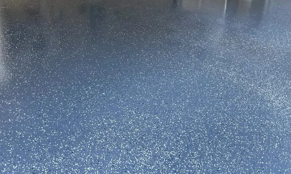 Garage with blue flake epoxy floor