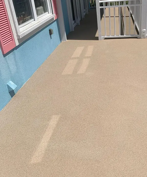 Sand-tan solid porch coating Broward County